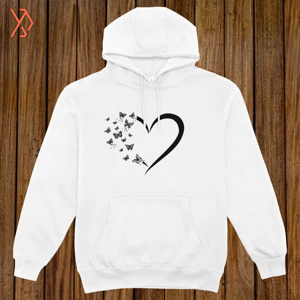 White hoodie with a black heart and butterfly design on a wooden background