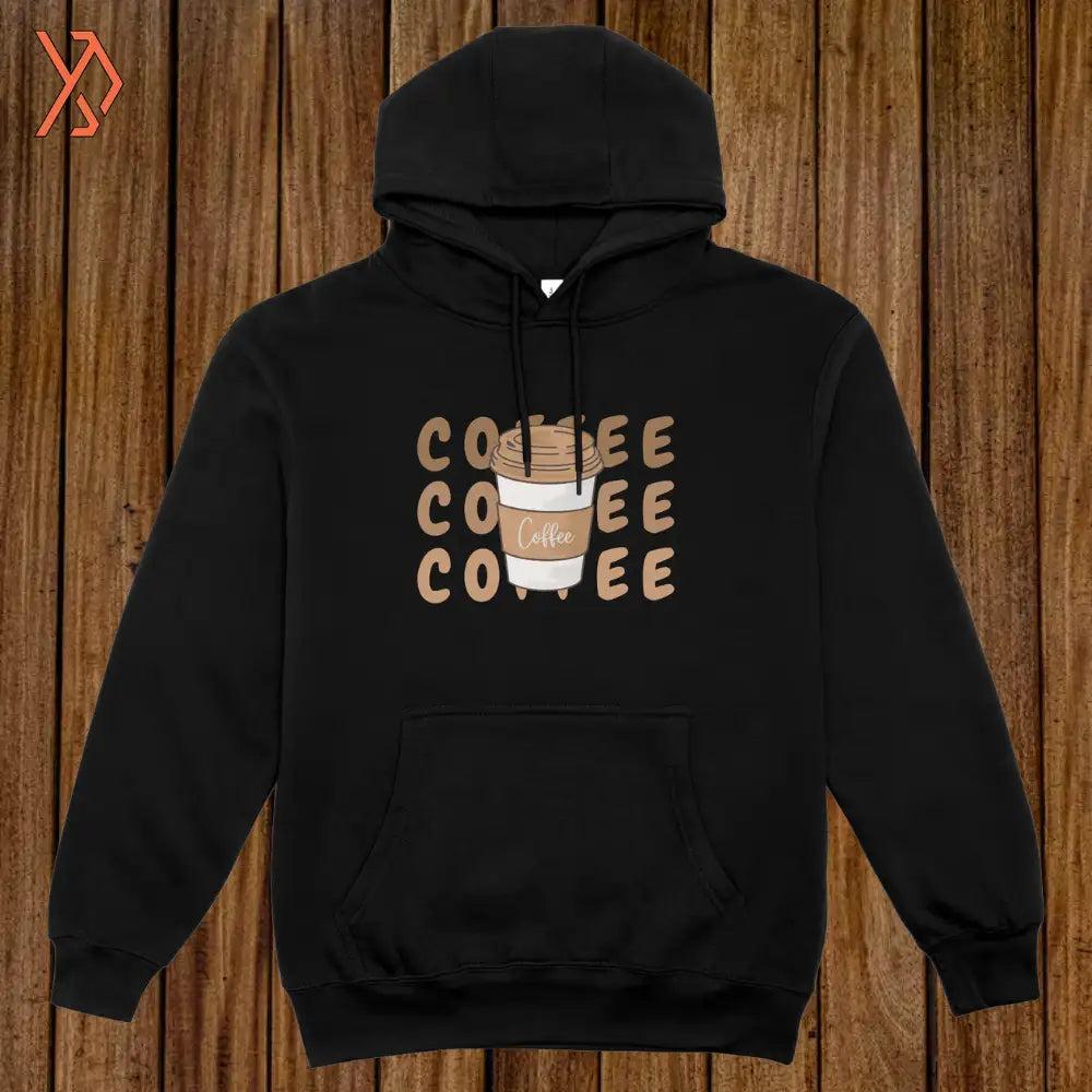 Black hoodie with 'COFFEE' text design on a wooden background